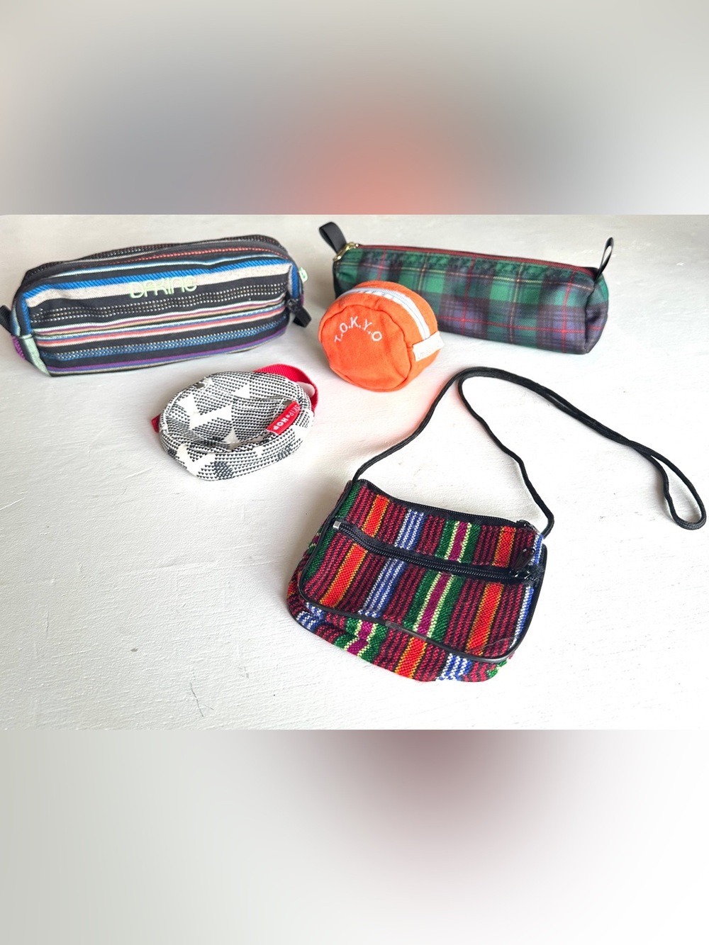 Lot of Colorful Pouches Dakine, Skip Hop etc…